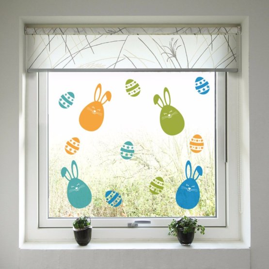 Easter decoration to window - Colorful bunnies a easter egg